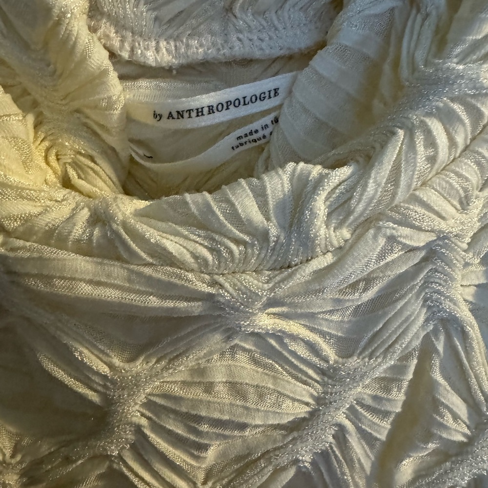 Puckered sleeveless mock turtleneck top. Ivory. anthropologies